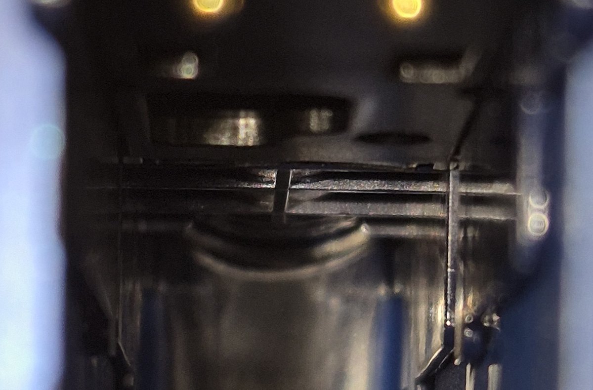 Internal battery section of a blue vape device